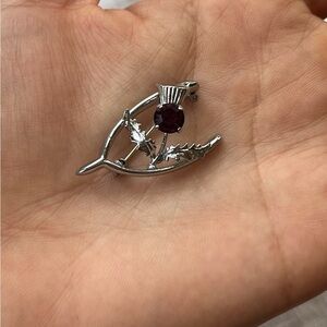 Vintage Mizpah wishbone brooch with thistle and purple stone